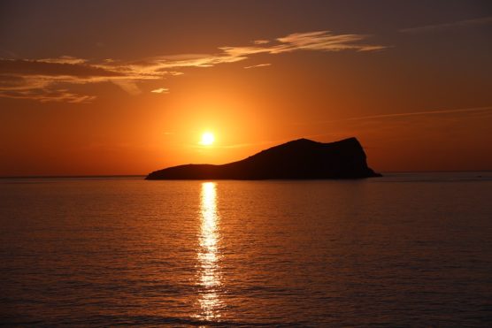 See a sunset in Ibiza with kids